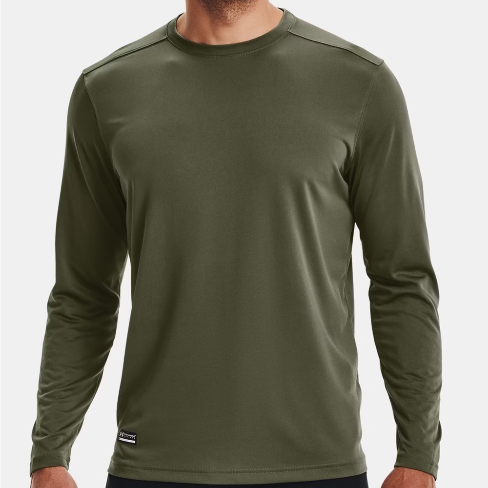 Under Armour long sleeve 100% polyester stretch material, it runs large